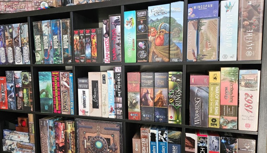 Some of my games stored on an Ikea Kallax shelf.