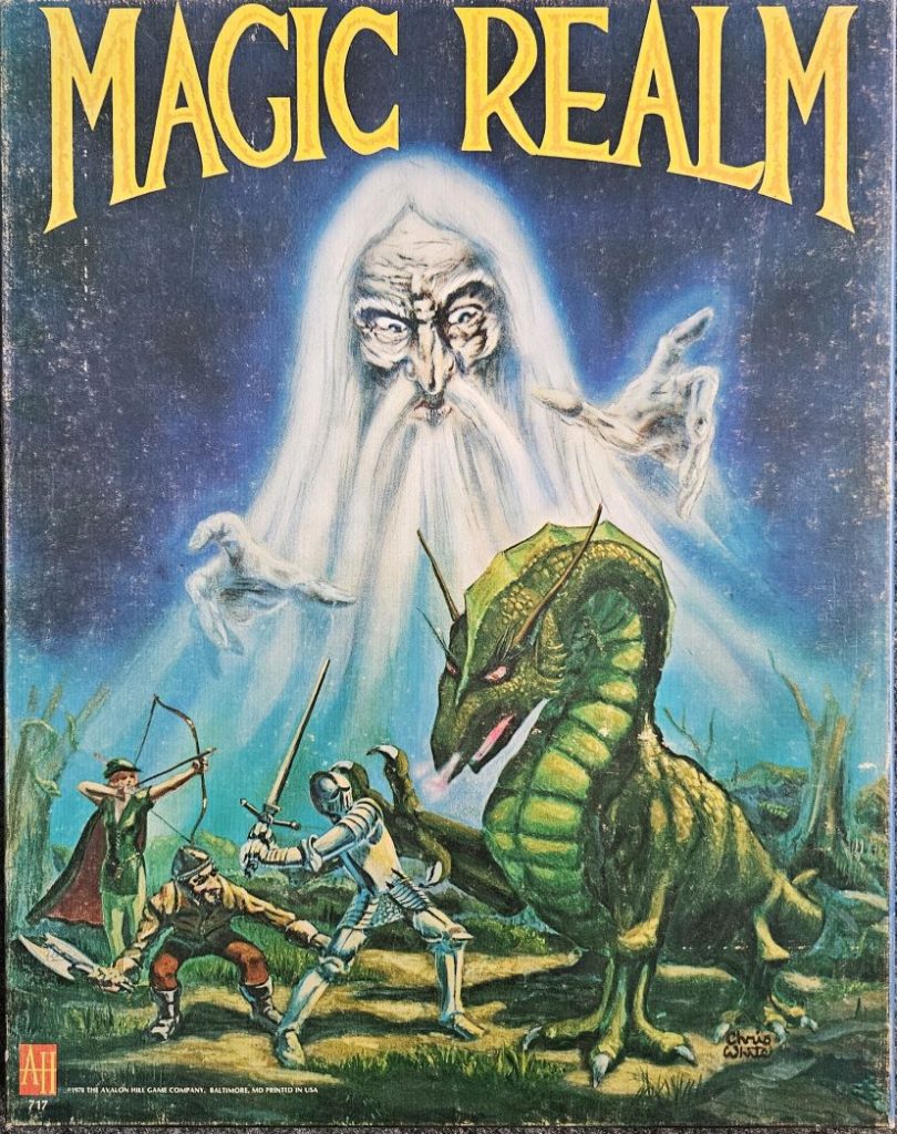 The cover of my copy of the board game Magic Realm. Three heroes face off against a dragon in the foreground. In the background, a wizard with long white hair and beard appears to be overlooking the scene. His hands are outstretched as if he is participating in, or maybe controlling, the action.