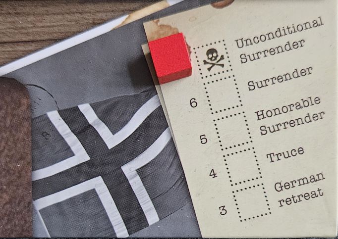 Closeup view of the Surrender Track section of the Halls of Hegra game board. The marker is next to the "Unconditional Surrender" space.